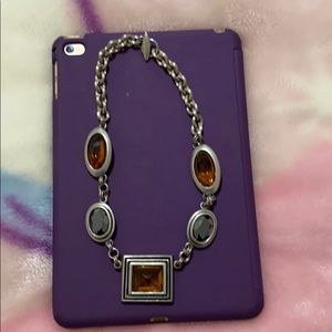 Statement necklace bought it from Neiman Marcus